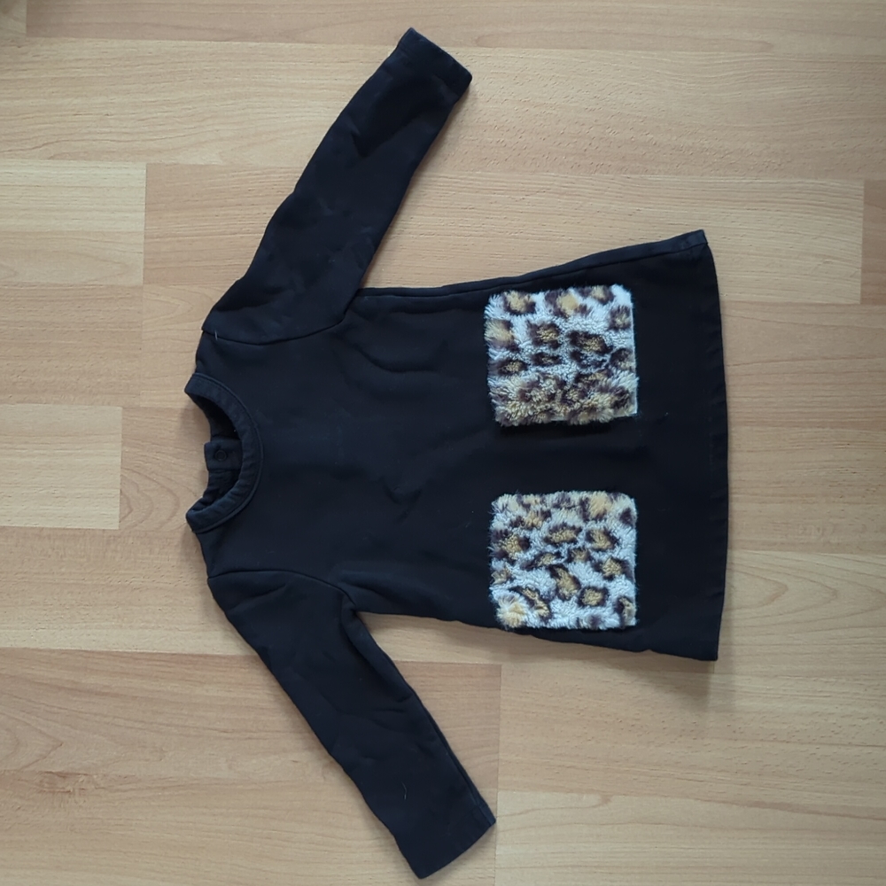 Black baby dress with faux fur pockets
